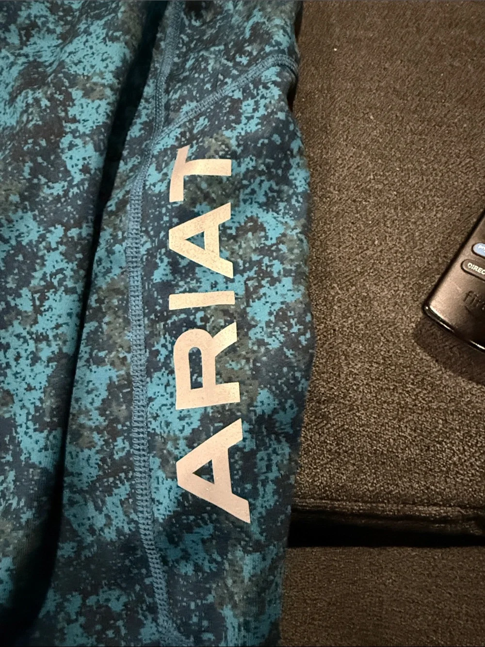 Ariat Teal and Black Girls' Printed Performance Leggings
For horse back riding - Picture 4 of 6